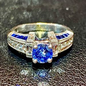 18K white gold ring accented with diamond and sapphire
